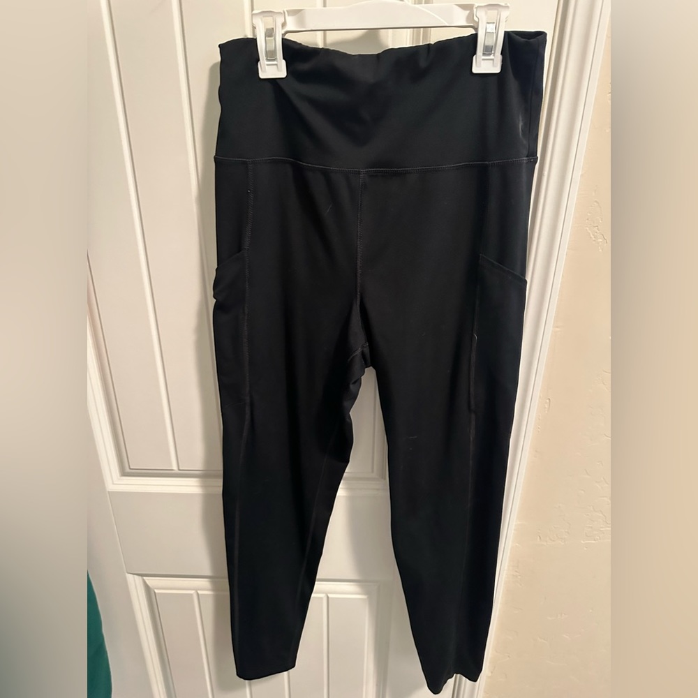 Two pairs of black leadings Danskin and AE